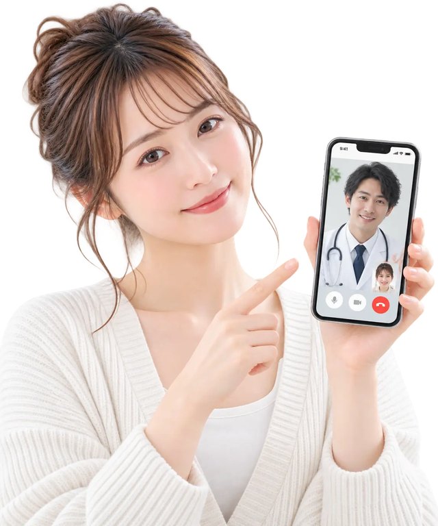 スマートフォンで医師とビデオ通話をしながらオンライン診療を受ける女性